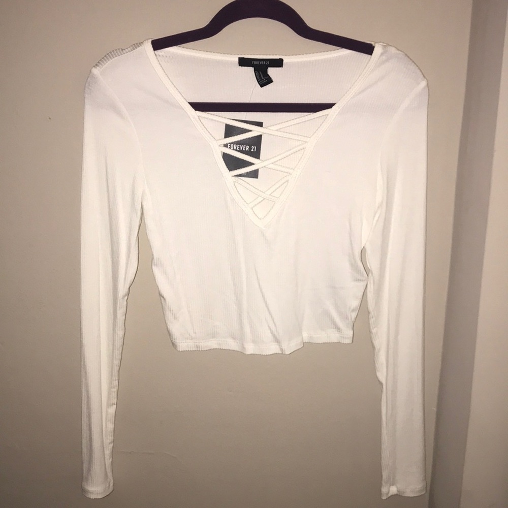 White crisscross long sleeve crop top